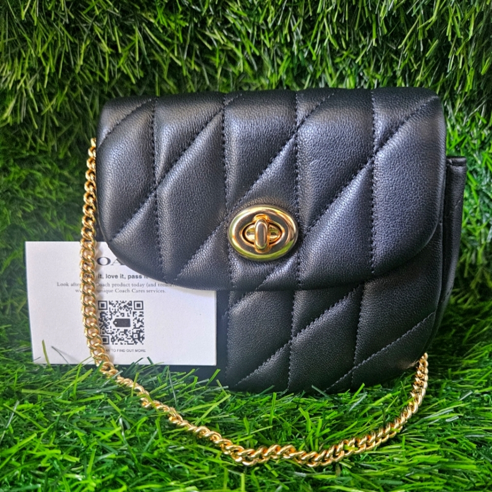 Coach Elegant Black Quilted Bag with Gold Chain